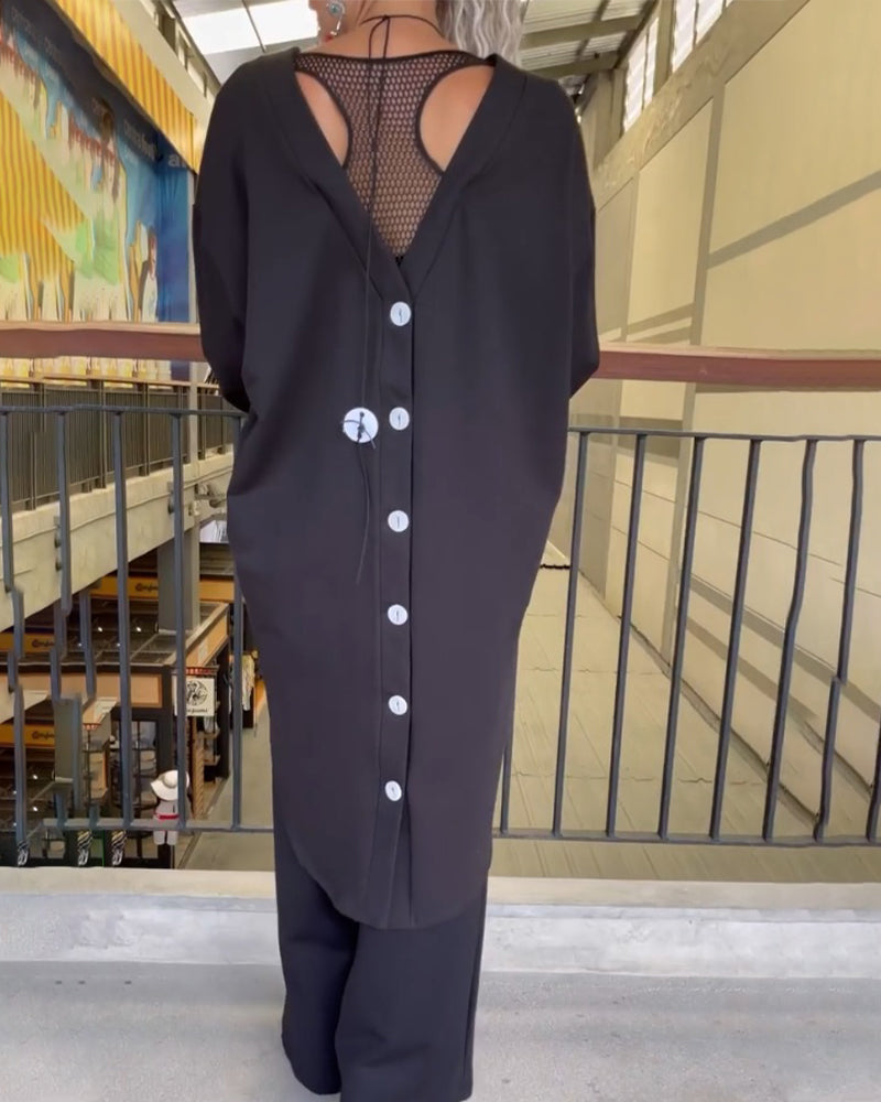 Lang top med knappelukning bagtil