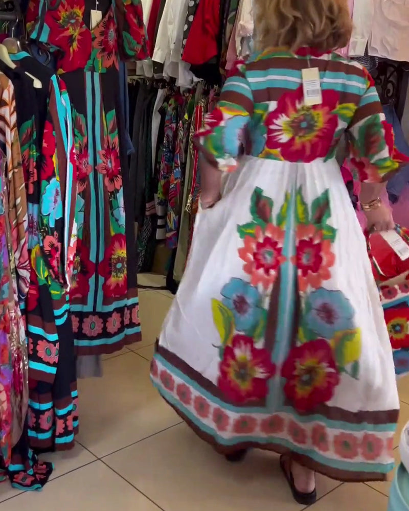 Lang blomsterkjole med svaj