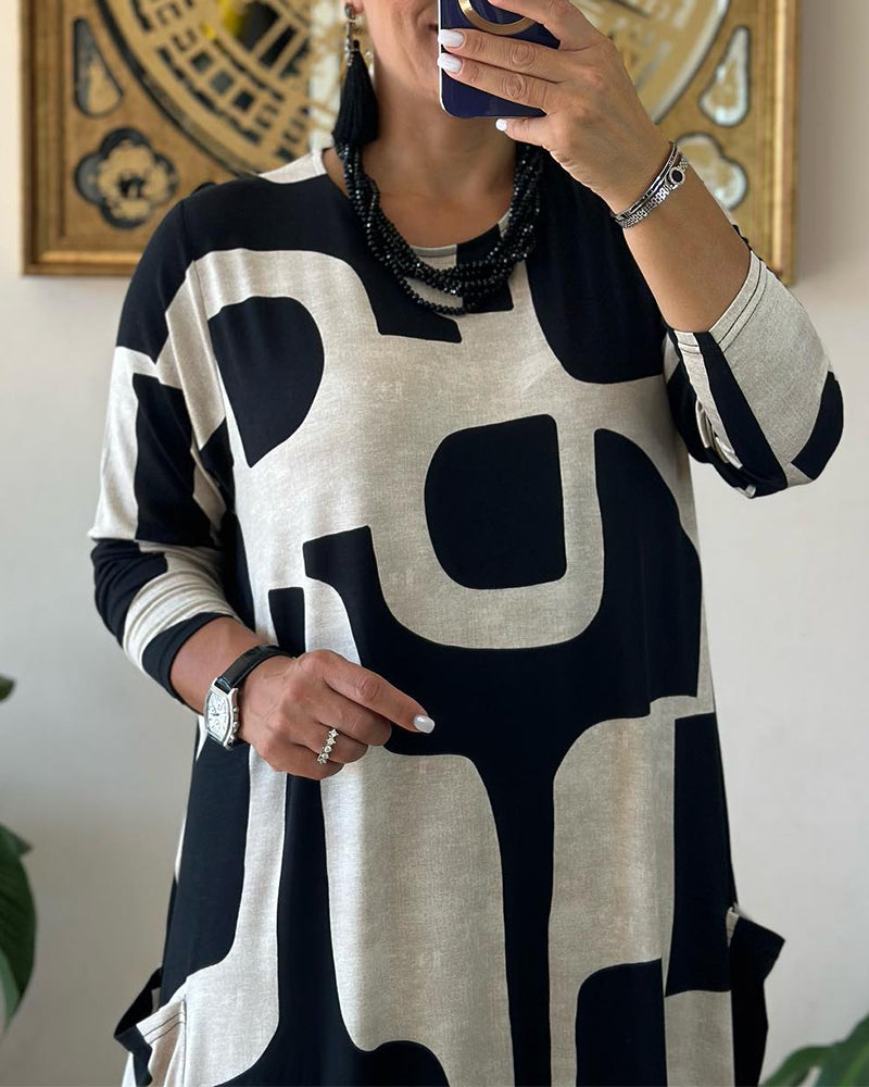 Kjole med lange ærmer og print