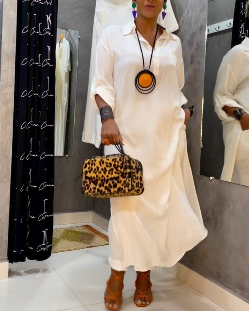 Hvid kjole med bred lapelkrave og lommer