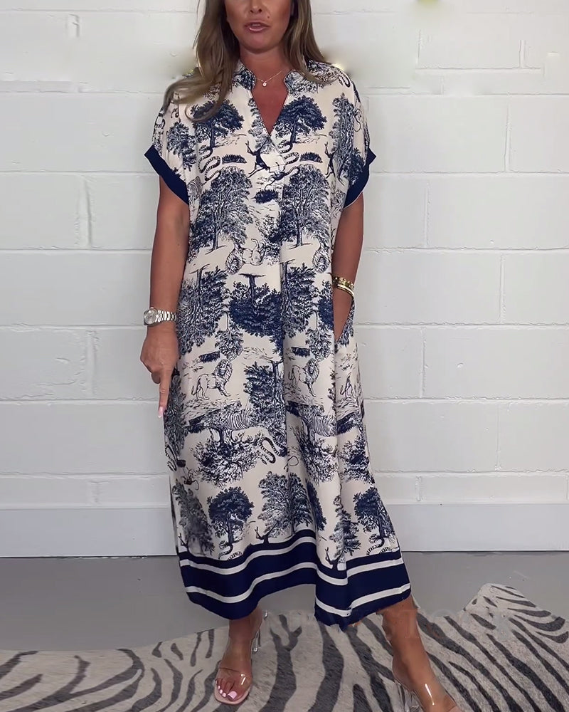 V-halset kjole med dyremotiv