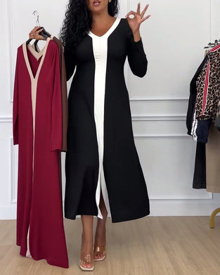 Elegant kjole med v-udskæring og hvid midterstribe