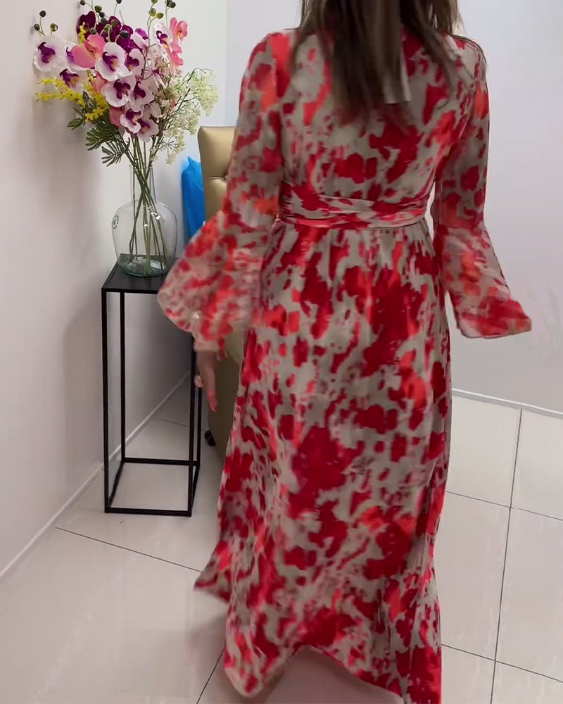 Stilfuld lang kjole med vide ærmer