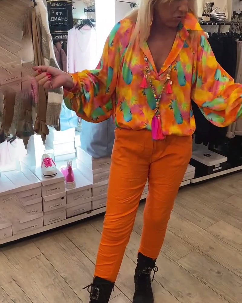 Orange bluse med reverskrave