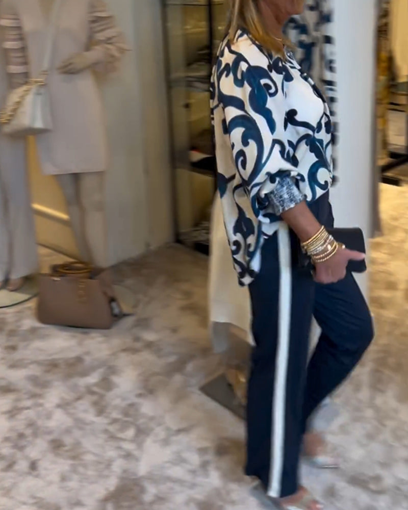 Bluse med lanterneærmer og retromønster