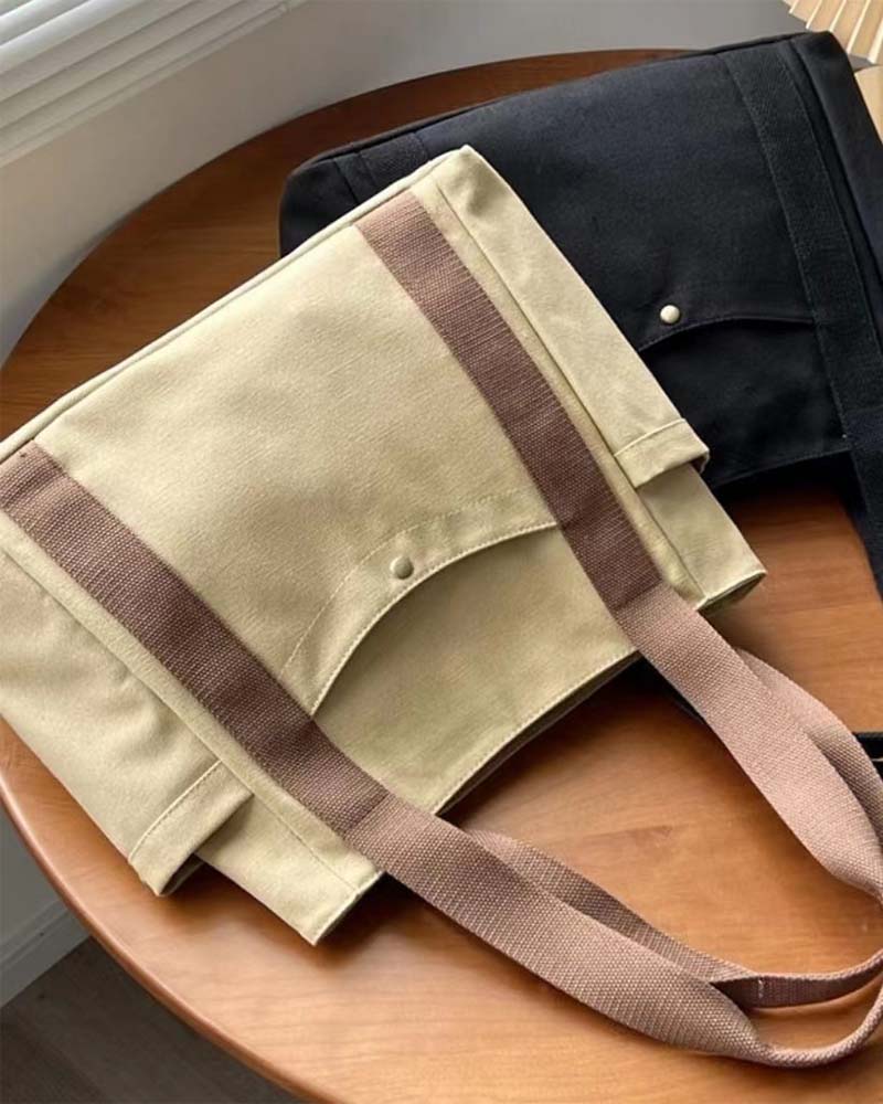 Kanvastaske med dobbelte hanke og stor kapacitet