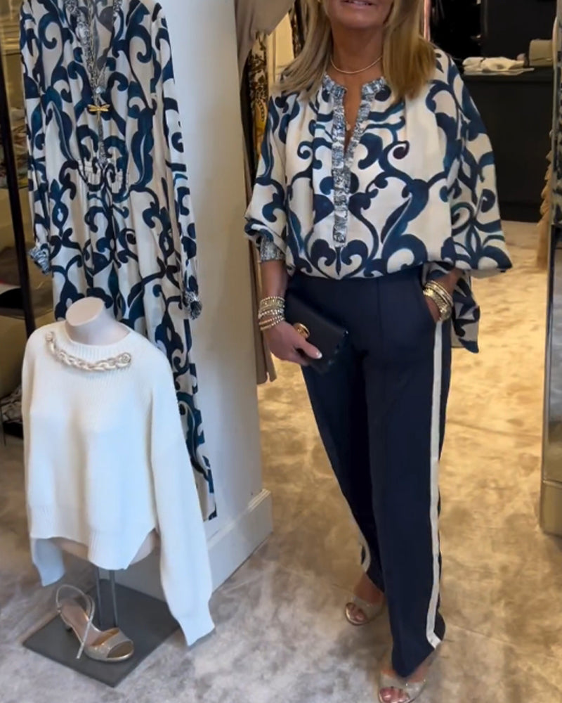 Bluse med lanterneærmer og retromønster