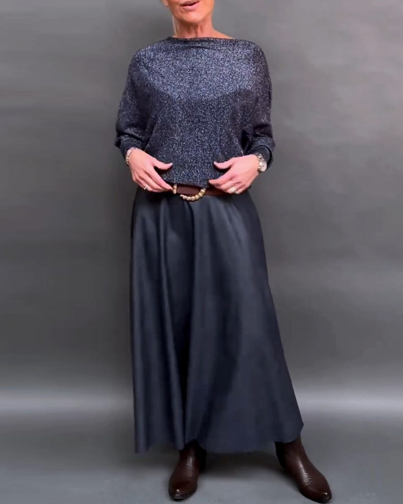 Skinnende top med rund hals og dolmanærmer