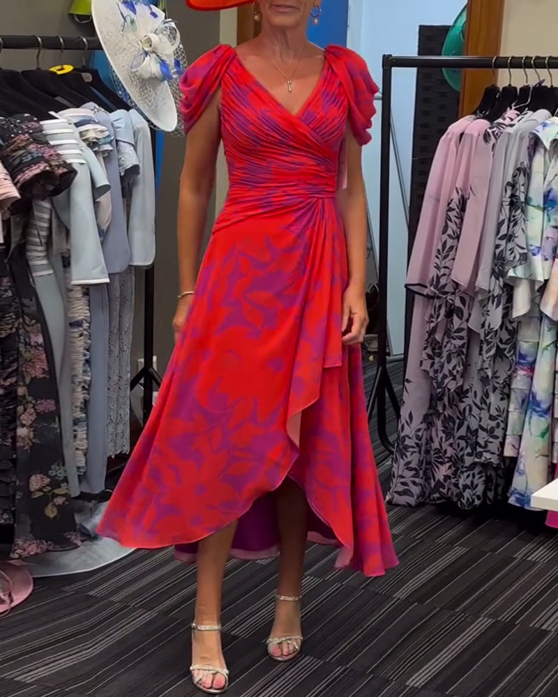 V-halset kjole med print og splitdesign