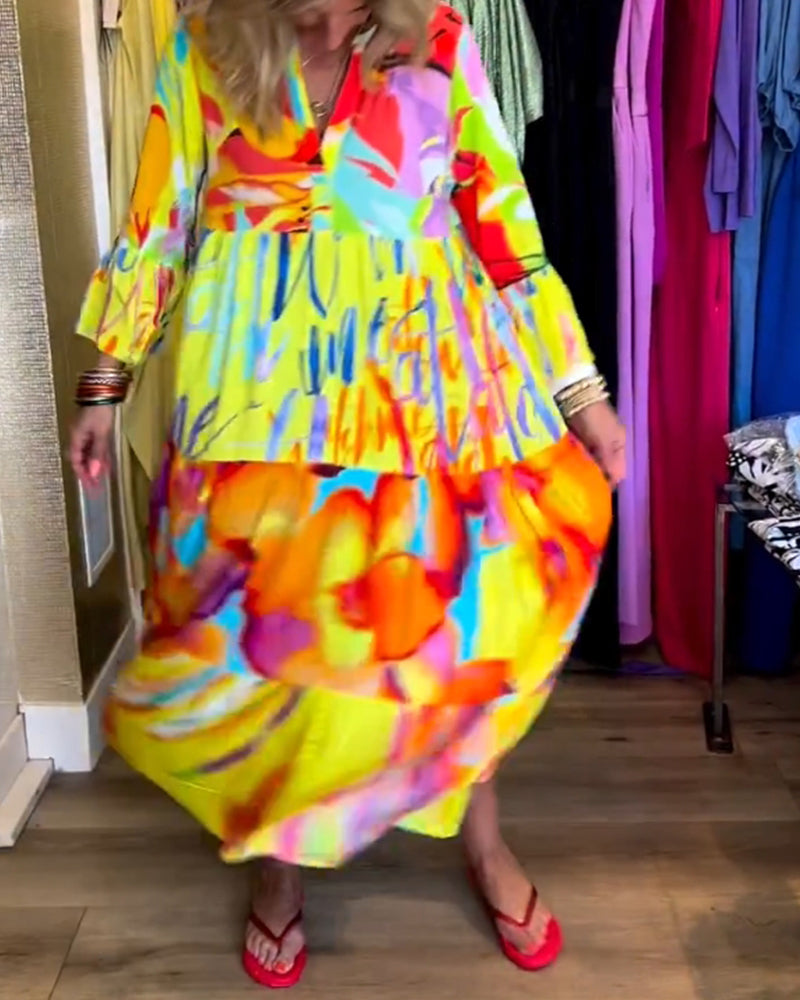 Farverig kjole med vide ærmer