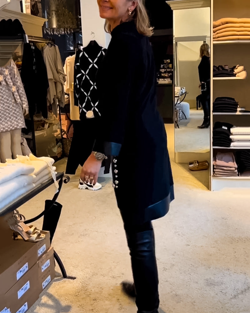 Afslappet kjole med rund hals og lommer