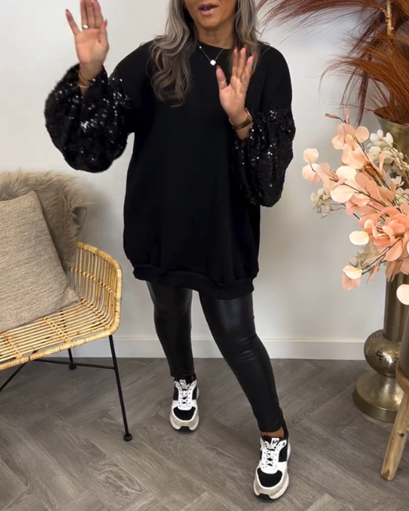 Ensfarvet sweater med vide ærmer