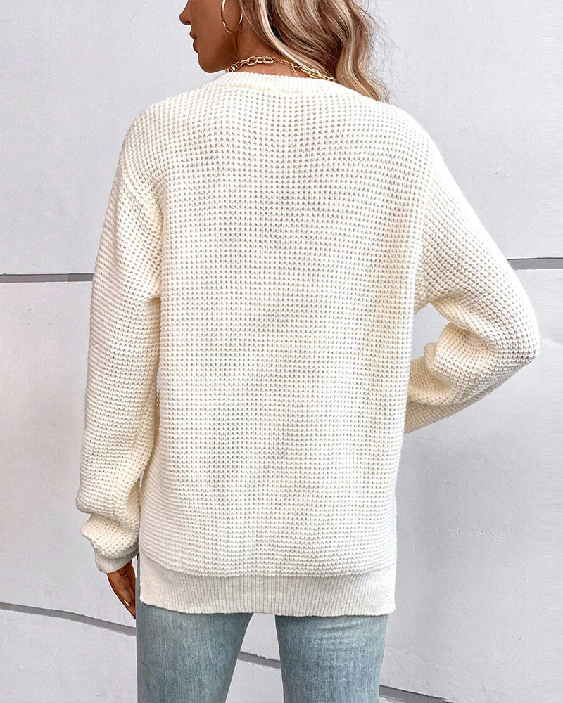 Hullet pullover med brystlomme