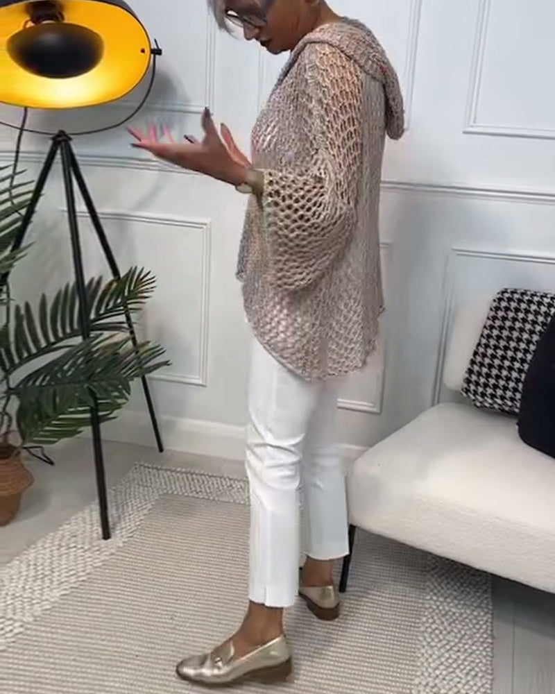 Ensfarvet hullet sweater i løs pasform