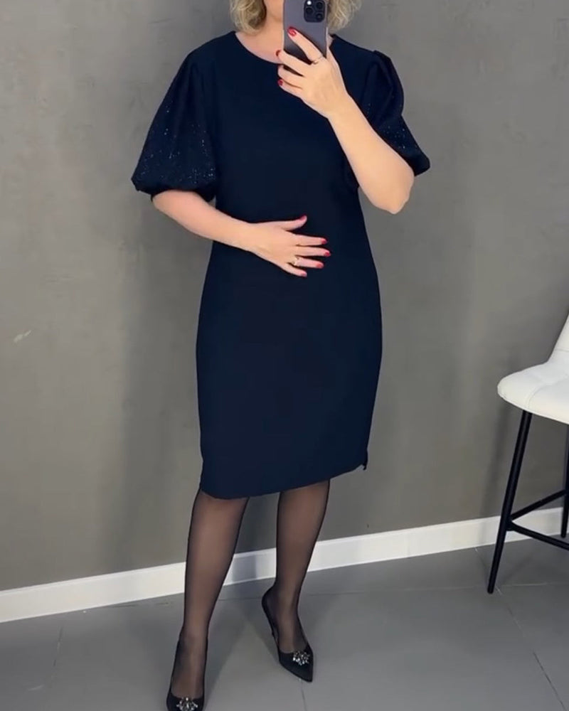 Kjole med elegante og skinnende puff ærmer